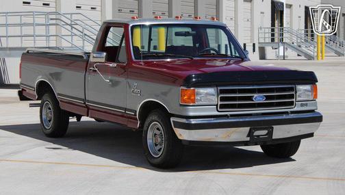Silver and Maroon 1990 Ford F-150