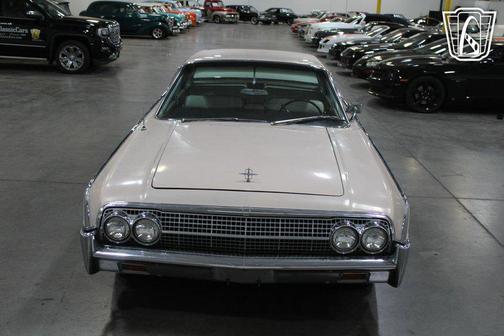 Yellow 1963 Lincoln Continental