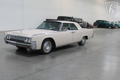 Yellow 1963 Lincoln Continental