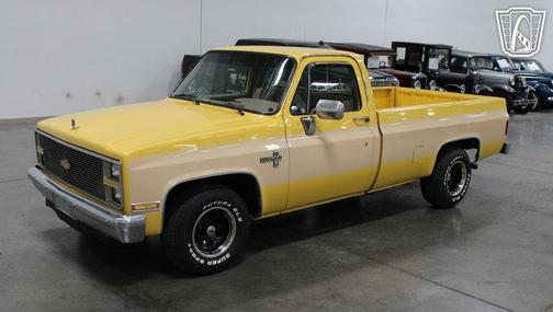yellow 1984 Chevrolet Pickup Truck Base
