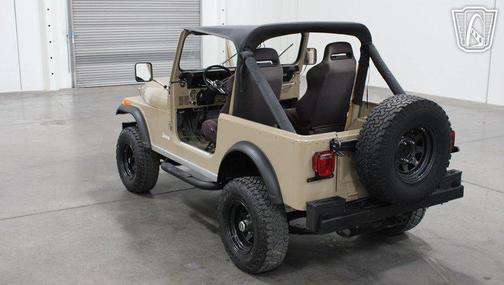 Tan 1983 Jeep CJ-7