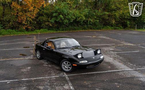 Black 1994 Mazda MX-5 Miata
