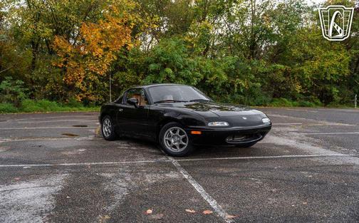 Black 1994 Mazda MX-5 Miata