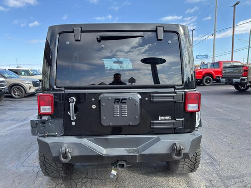 Black 2012 Jeep Wrangler Unlimited Sahara