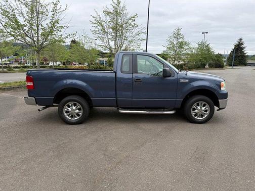 True Blue Clearcoat Metallic/Silver Clearcoat Metallic 2006 Ford F-150 XLT