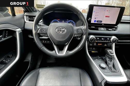 Wind Chill Pearl/Midnight Black Metallic 2023 Toyota RAV4 Hybrid SE