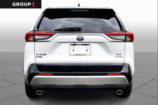 Wind Chill Pearl/Midnight Black Metallic 2023 Toyota RAV4 Hybrid SE