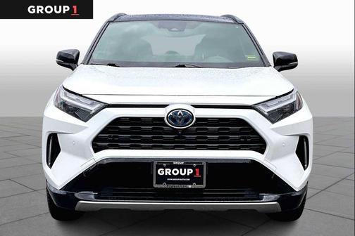 Wind Chill Pearl/Midnight Black Metallic 2023 Toyota RAV4 Hybrid SE