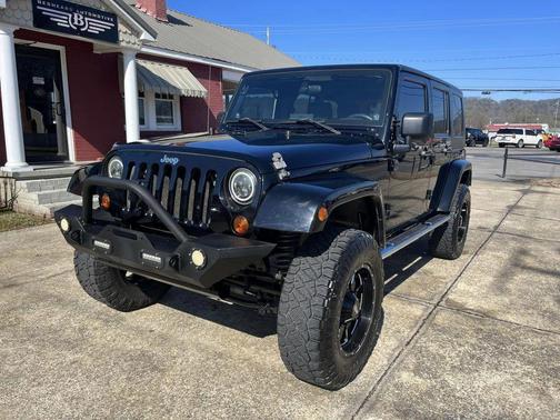 Photo 2 of 11 of 2009 Jeep Wrangler Unlimited Sahara
