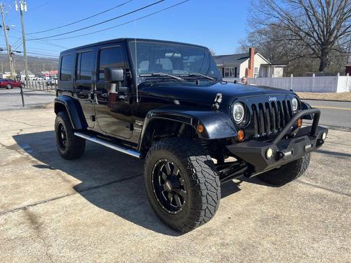Photo 4 of 11 of 2009 Jeep Wrangler Unlimited Sahara