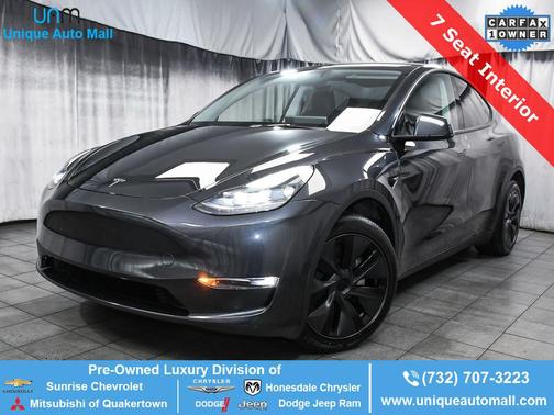 Stealth Gray 2025 Tesla Model Y Long Range Dual Motor All-Wheel Drive