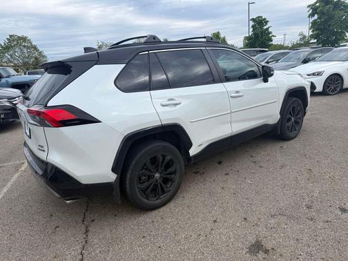 Wind Chill Pearl/Midnight Black Metallic 2023 Toyota RAV4 Hybrid SE