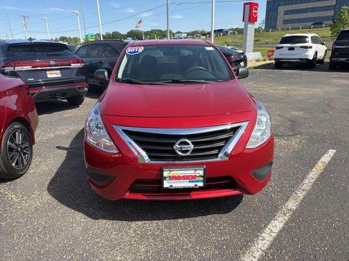 Red Brick 2015 Nissan Versa 1.6 S+
