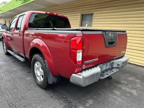 Red Braun 2008 Nissan Frontier SE Crew Cab