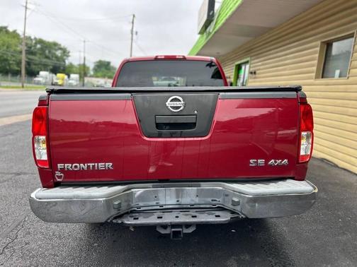 Red Braun 2008 Nissan Frontier SE Crew Cab