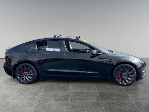 Solid Black 2022 Tesla Model 3 Performance