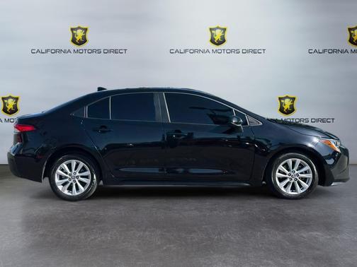 Midnight Black Metallic 2025 Toyota Corolla LE
