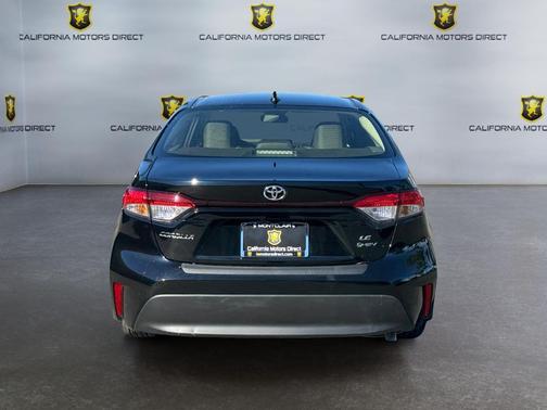 Midnight Black Metallic 2026 Toyota Corolla Hybrid LE