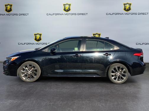 Midnight Black Metallic 2024 Toyota Corolla Hybrid SE