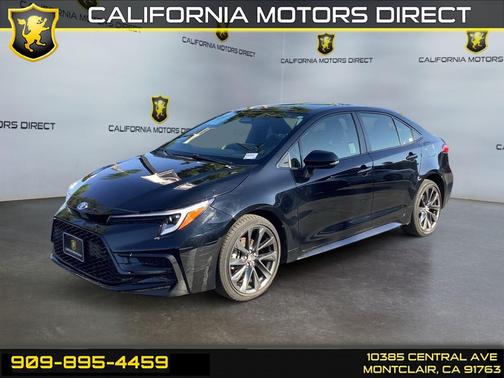 Midnight Black Metallic 2024 Toyota Corolla Hybrid SE