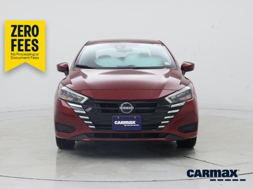 Red 2025 Nissan Versa SV