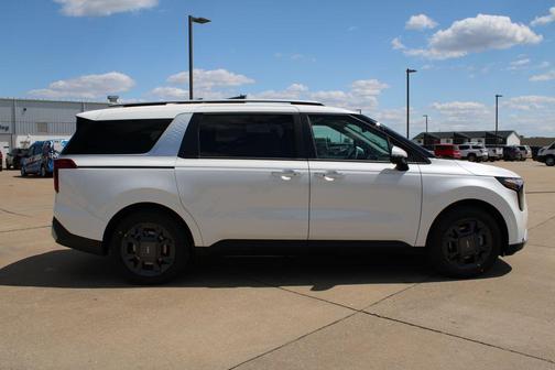 White 2026 Kia Carnival Hybrid EX
