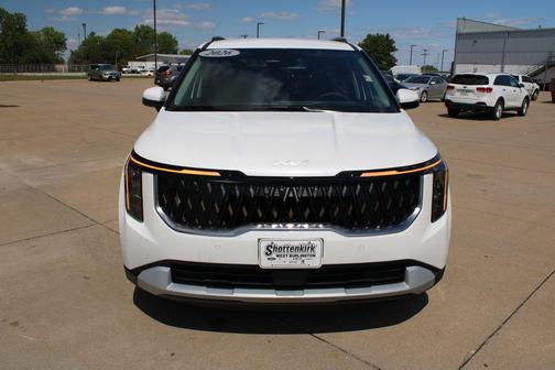 White 2026 Kia Carnival Hybrid EX
