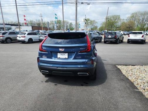 Deep Sea Metallic 2024 Cadillac XT4 Premium Luxury