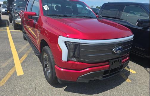 Rapid Red Metallic Tinted Clearcoat 2023 Ford F-150 Lightning LARIAT