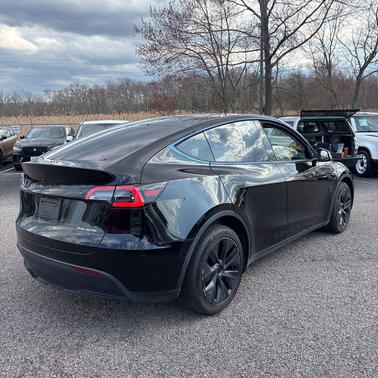 Solid Black 2025 Tesla Model Y Long Range Dual Motor All-Wheel Drive