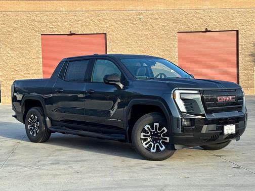 Deep Ocean Metallic 2026 GMC Sierra EV Standard Range Elevation