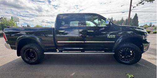 Black 2014 RAM 1500 Laramie