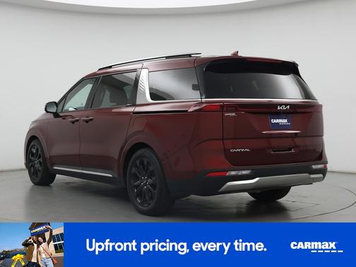 Burgundy 2023 Kia Carnival SX Prestige