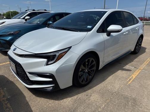 Wind Chill Pearl 2025 Toyota Corolla Hybrid SE