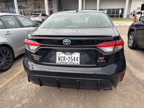 Midnight Black Metallic 2025 Toyota Corolla Hybrid SE