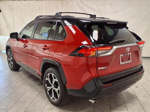 Supersonic Red/Midnight Black Metallic 2025 Toyota RAV4 Hybrid SE