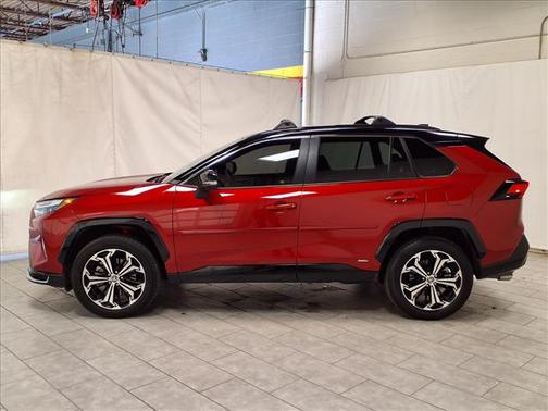 Supersonic Red/Midnight Black Metallic 2025 Toyota RAV4 Hybrid SE