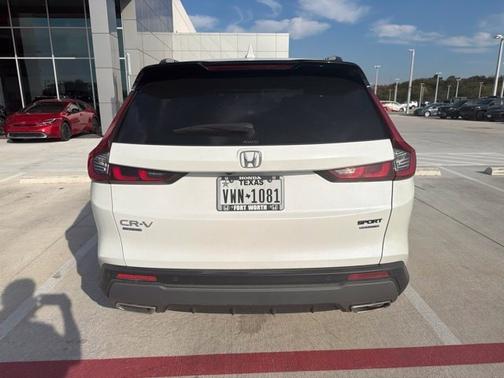 Platinum White Pearl 2025 Honda CR-V Hybrid Sport Touring AWD