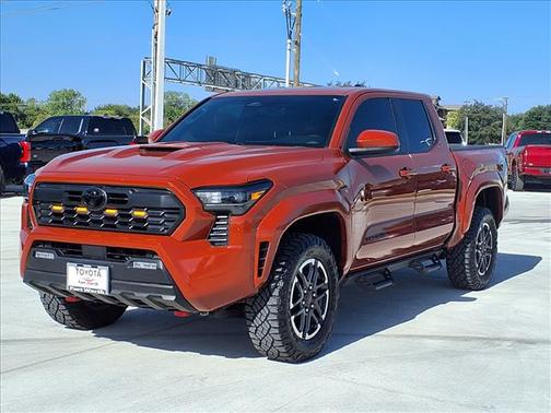 Orange 2025 Toyota Tacoma TRD Sport