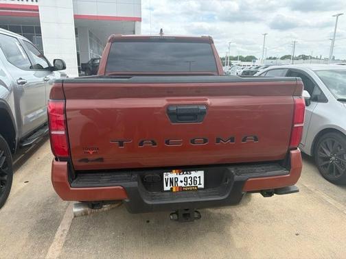 Orange 2025 Toyota Tacoma TRD Sport