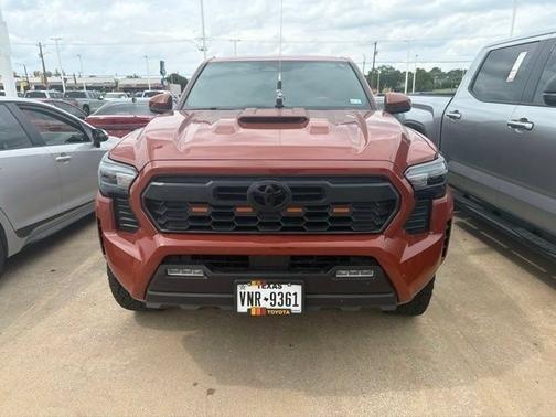 Orange 2025 Toyota Tacoma TRD Sport