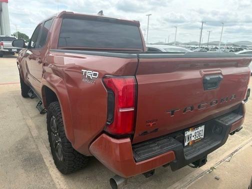 Orange 2025 Toyota Tacoma TRD Sport
