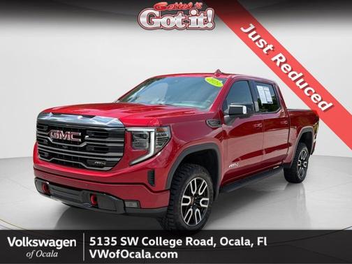 Volcanic Red Tintcoat 2023 GMC Sierra 1500 AT4