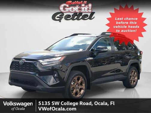 Midnight Black Metallic 2023 Toyota RAV4 Hybrid Woodland