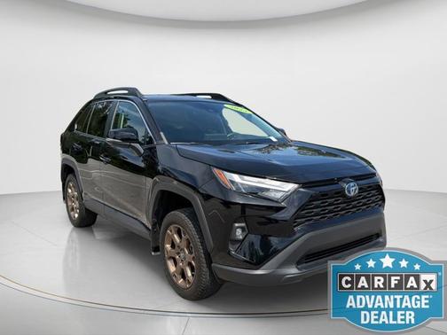 Midnight Black Metallic 2023 Toyota RAV4 Hybrid Woodland