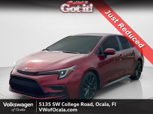 Ruby Flare Pearl/Midnight Black Metallic 2025 Toyota Corolla SE