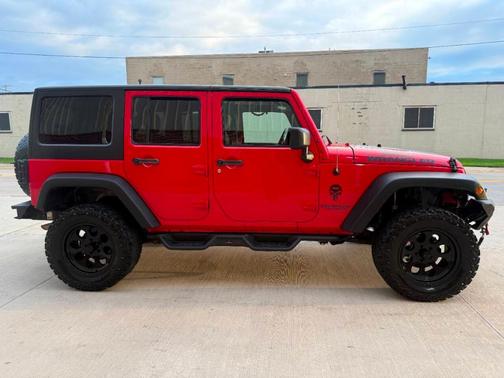 Red 2017 Jeep Wrangler Unlimited Sport