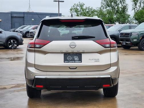 Champagne Silver Metallic/Super Black 2026 Nissan Rogue Platinum