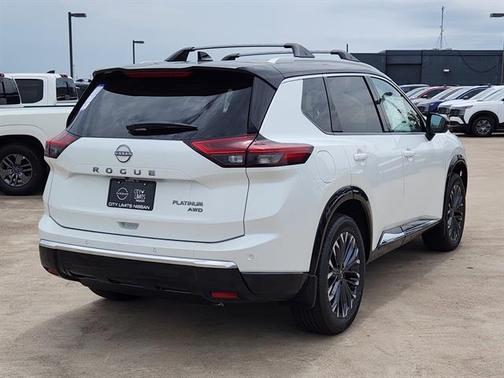 Everest White Pearl/Super Black 2026 Nissan Rogue Platinum