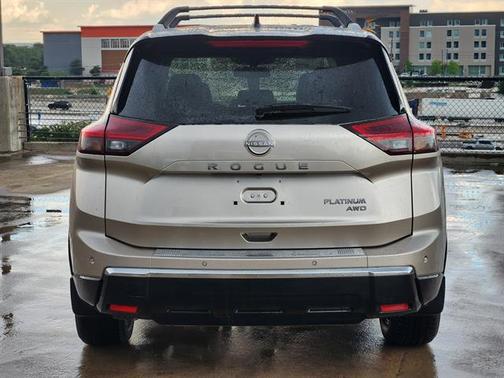 Champagne Silver Metallic/Super Black 2026 Nissan Rogue Platinum